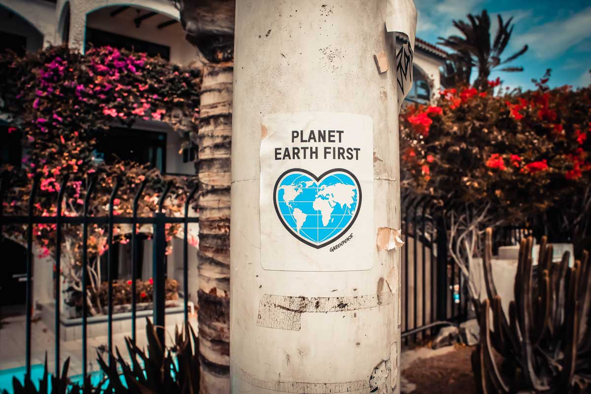 Sign that says "Planet Earth First"