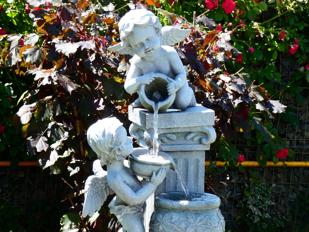 Sculpture Fountain Depicting Children Pouring Water