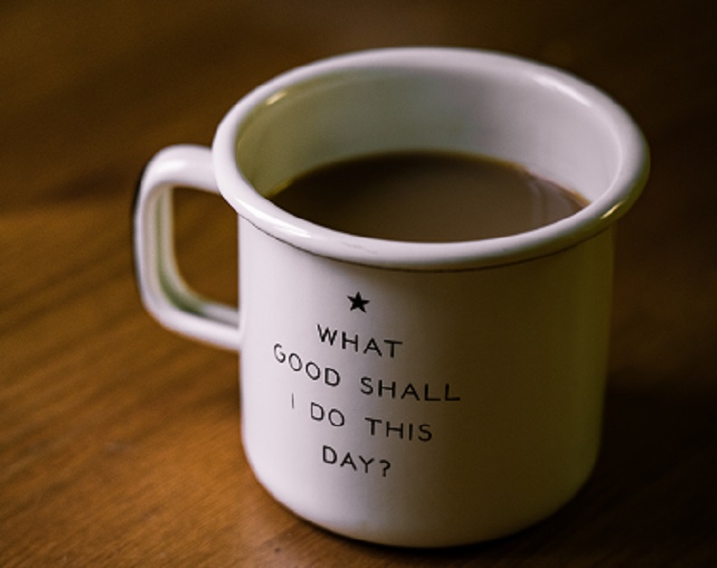 Coffee cup with quote "what good shall I do this day"