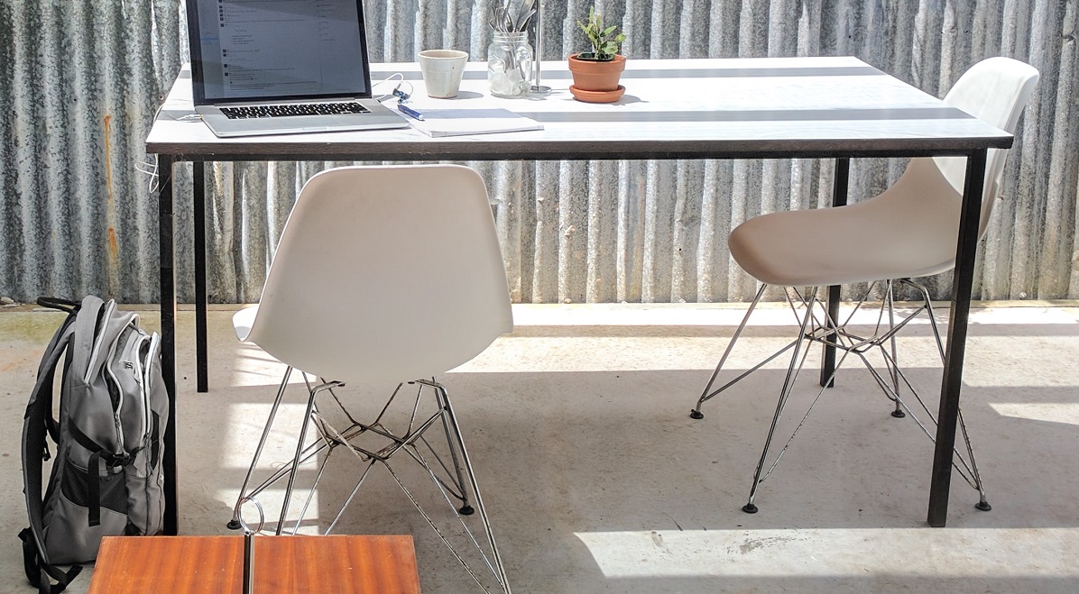 Outdoor work area with backpack