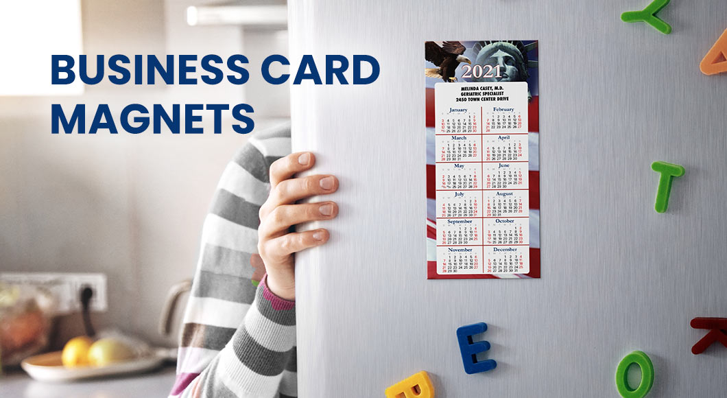 Business card magnets on fridge