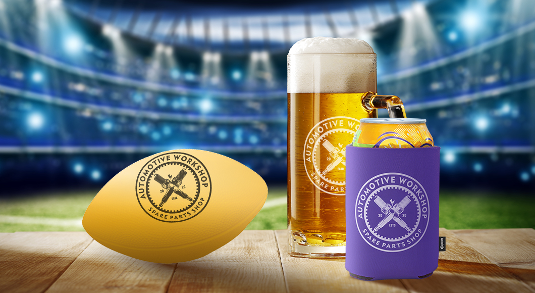 Football stadium featuring table with Game Day restaurant promotion ideas like customized football, KOOZIE (r) brand can cooler, and beer stein with logo.