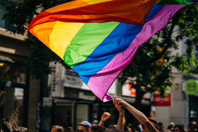 LGBTQIA+ rainbow flag at PRIDE parade.