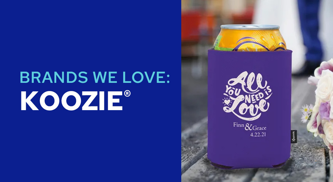 Purple Koozie Brand Kan Cooler with can inside on picnic table outside with flowers