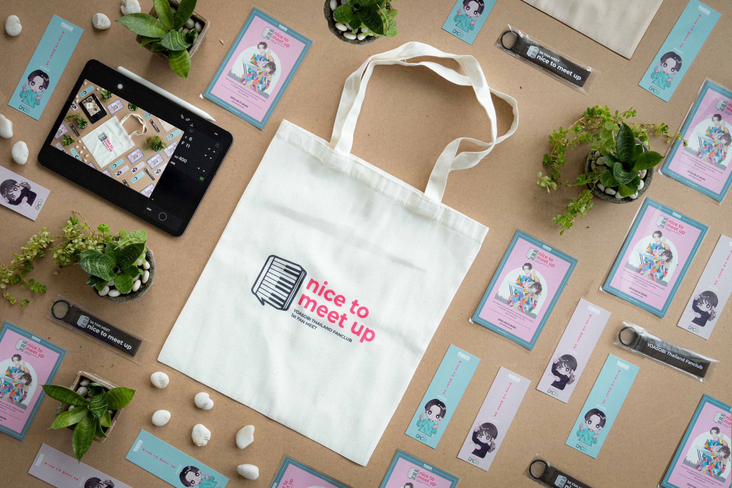 cute promotional stationery and bags displayed on a table top