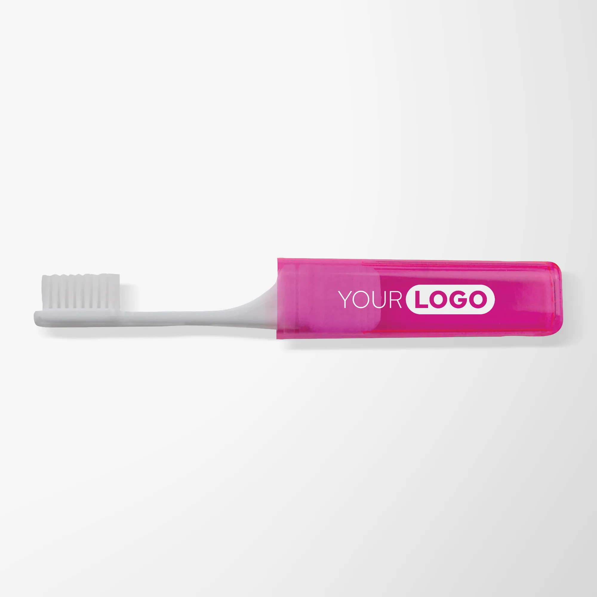 Travel toothbrush with bright pink case.